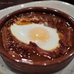 バルケッタ - 《赤みそで煮込んだトリッパのオーブン焼き　玉子のせ》