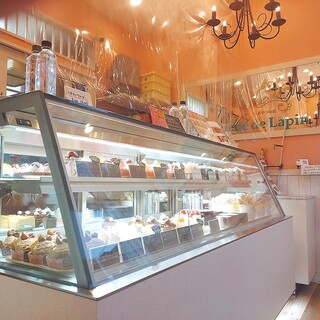 A stylish pale pink cake shop located right next to Ebina Station.