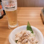 豊洲市場 さかな酒場 魚星 - スーパードライ(中ジョッキ)/酢もつ