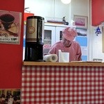 コペンハーゲン - ピンクのギンガムチェックがトレードマークのハンセンさん