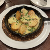 トラットリア イル レガーロ - じゃがいもと花畑牧場　ラクレットチーズ 1,078円