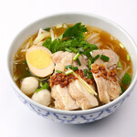Thai street food stall's soup soba noodles topped with steamed chicken Kuitti Ogai