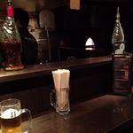 CONA 渋谷店 - カウンター上にペペロンオイルのデカイ瓶