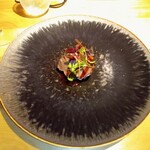 ヴァカンツァ - 牛肉の何とか。パクチー入ってました。