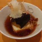 海鮮居酒家 和み家 - お通し( 揚げナス 揚げ出し豆腐) 300円