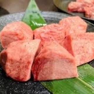 Our signature dish, ``Thick Sliced Tongue Cubes,'' has a flavor that disappears in your mouth quickly.