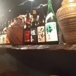 Yamakyuu - カウンターに一升瓶