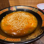 一蘭 - 秘伝のタレ（３倍）が入った赤いスープに、替玉（210円）を投入。