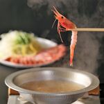 Shrimp served in shrimp broth shabu shabu