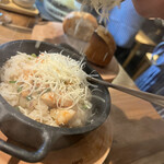 海老丸らーめん - リゾット　目の前でチーズ削り