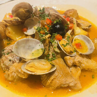 マヌエル タスカ ド ターリョ 丸の内店 - イベリコ豚とアサリのアレンテージョ風ソテー