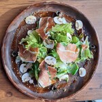 Spanish jamon serrano and mushroom salad truffle flavor