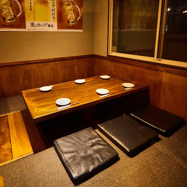 座席 : 炭火野菜巻き串と餃子 博多うずまき 札幌大通り店 - 西8丁目