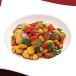 Colorful stir-fry with domestic chicken breast and cashew nuts