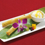 Banana custard spring rolls with coconut ice cream