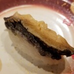 回転寿し トリトン - 厚切りあわび。