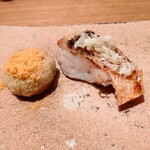 虎白 - 塩味がすこし強いマツカサウオとその鱗(鱗には味が殆ど無く強めの塩気にした訳に納得)隣にはそら豆餠