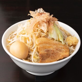 The soup is simmered for a long time and has a “tonkotsu base” packed with flavor.