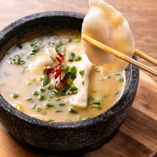 Chicken paitan soup Gyoza / Dumpling served in a piping hot stone pot!