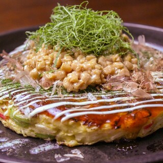 Enjoy `` Okonomiyaki'' made with carefully selected ingredients and our secret sauce♪