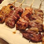 Hand-sliced Yakitori (grilled chicken skewers) every day