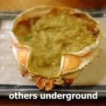 磯丸水産 - 蟹味噌甲羅焼