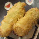 大阪串かつ てん家わん屋 - 【季節串】「たらの芽串」：塩をふってあります！サクッと心地良い歯応えと共に
      弾ける蒼い香り！
      