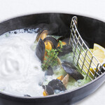 Mussels and clams steamed in herb butter and white wine