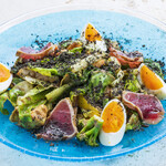 Rare grilled tuna and hot Nicoise salad with chunky vegetables