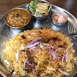 サプナ 本八幡店 - 見た目でもわかるビリヤニのボリューム！
                                しかもしかも、マトンがごろんごろん出てきます