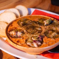 カルネジーオ イースト - タコのガーリックバターオーブン焼き