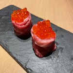 Meat Sushi topped with salmon roe