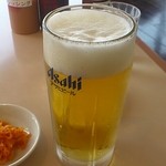 くいどん - ランチビール350円と漬物
