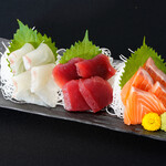 Three pieces of sashimi