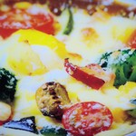 門司港茶寮 - 野菜の焼きカレー　七種類の野菜をトッピングした見た目も色鮮やかでボリュームのある一品です。