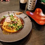 論露に不二 - 替玉 鮟肝のソース　350円
      
      赤いお皿は取り分け用