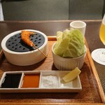 つつみ屋 - 串が向けられているのがオススメの調味料(この場合はレモンもしくは塩)
