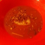 空と大地のトマト麺 Vegie  - リゾットおむすび(180円)投入