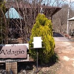 Adagio - In front of the building, there is a terrace seating area where pet owners and international guests were dining on this day.