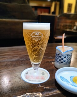 Katsukichi - 食べログのクーポンでいただいたビール(^_^)／□