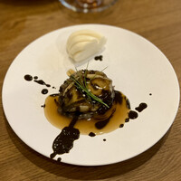 NOGI - 勇名物 活鮑の浅利出汁紹興酒バターソース 肝醤油ソース 二種のソースで炒めて