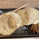 肉汁餃子のダンダダン - 餃子の皮煎餅