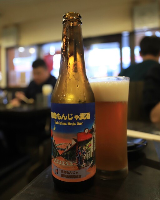 Tsukishima Meibutsu Monja Daruma Tsukishima Honten photo 2