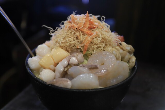 Tsukishima Meibutsu Monja Daruma Tsukishima Honten photo 3