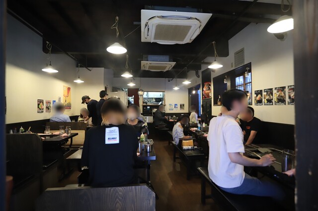 Tsukishima Meibutsu Monja Daruma Tsukishima Honten photo 4