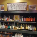 Fukusuke - 店内の焼酎棚