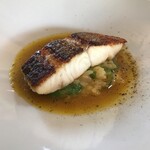 フェルミエ - スズキのポワレ、レモンリゾット　サフランソース