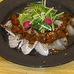 Seared sea bass carpaccio with fresh tomato sauce