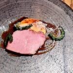 sio - 岩中豚チャンプルー風に卵黄パルミジャーノソースシェリービネガーソースゴーヤー。黄身ソースが濃厚甘みのあるシェリービネガーソースやゴーヤの苦味、お肉の味わいと合わさって楽しい美味しさ♪