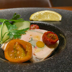 Daisen chicken thigh and seasonal vegetable galantina served with semi-dried tomatoes